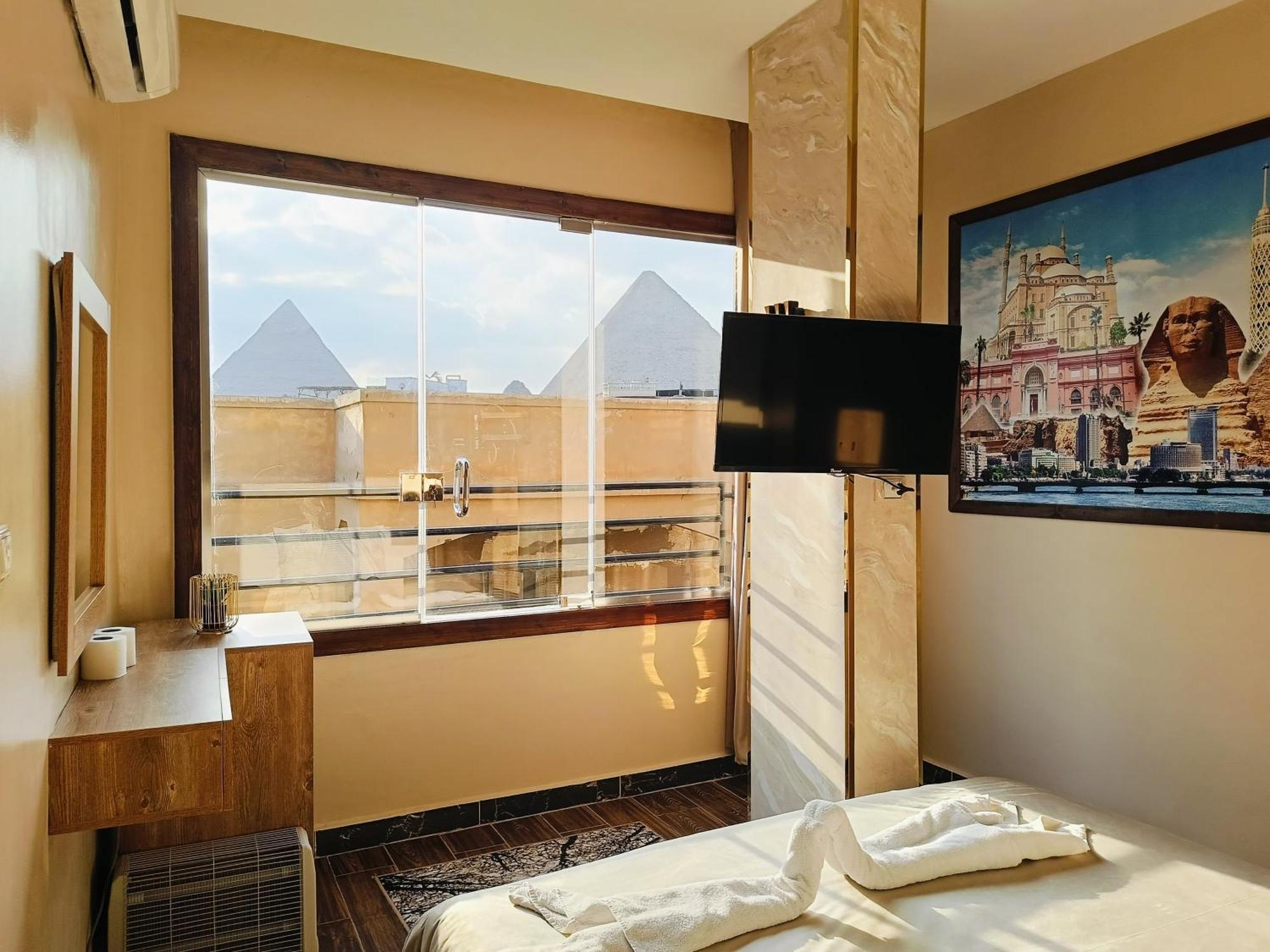 Отель Magic Golden Pyramids View Kafrat al Jabal Экстерьер фото